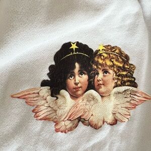Fiorucci cream sweatpants with angels on back